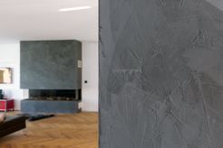 Wohnhaus - Wandflächen und der Kamin wurden mit der Glättetechnik StuccoDecor di Luce von Caparol gestaltet