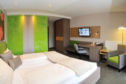 Hotel Forellenhof in Bad Sassendorf - Spachtelung einer Wandfläche mit der Eigenkreation Ambiente in grün
